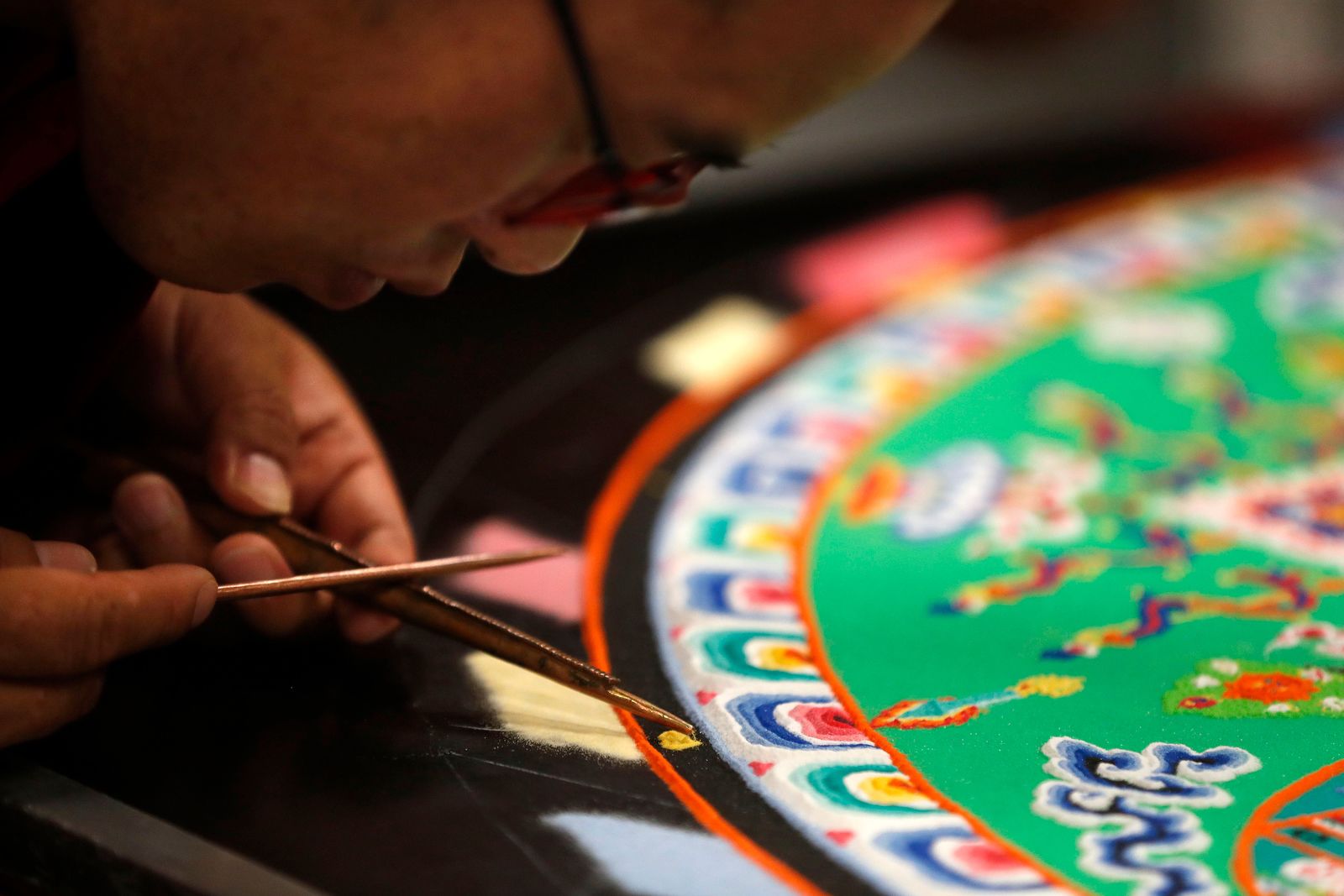 Painstakingly created, then swept away: Tibetan monks' sand mandala at Lily Dale
